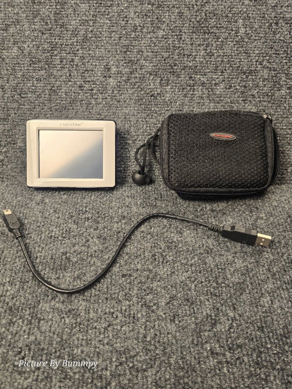 Nextar portable GPS navigation system.